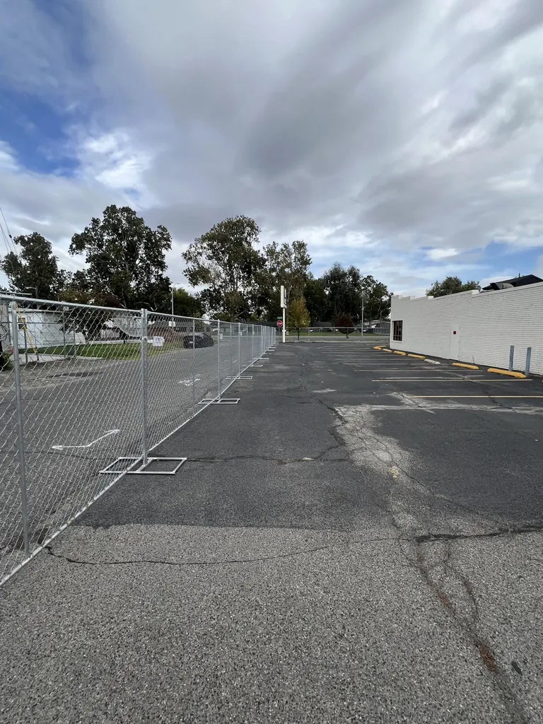 Long run of temporary chain-link fence panels installed at a Pasco, Washington project site